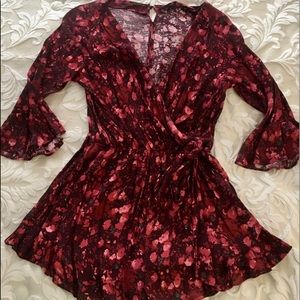 Like new! Free people long sleeve romper! Size M